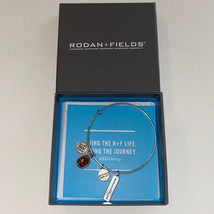 Rodan + and Fields Level II Dangle Bracelet